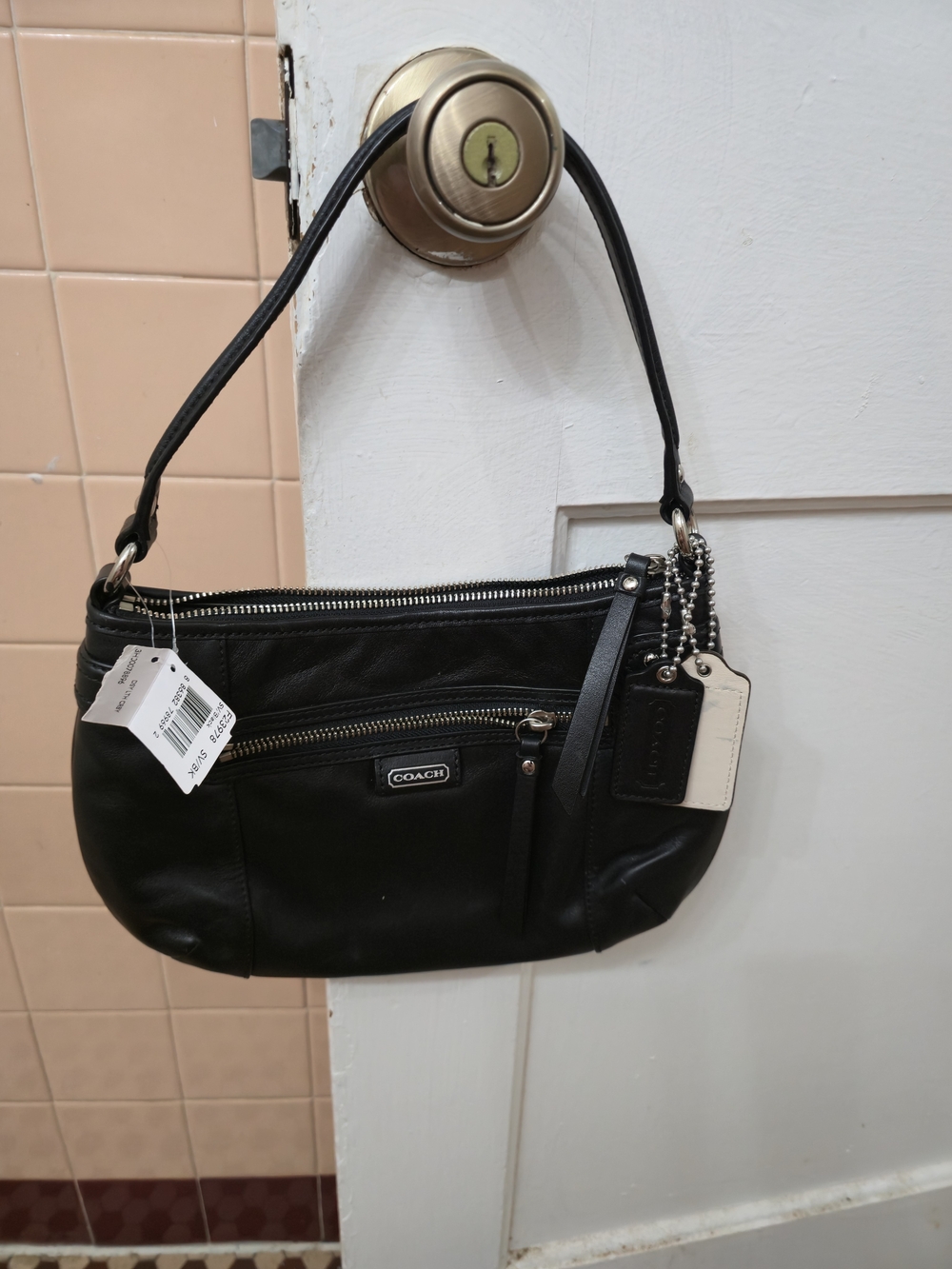 NWT Coach Black Leather Shoulder Bag with Zip Closure; Pockets and Tags. $150